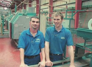 Two UPU Industries staff in the factory